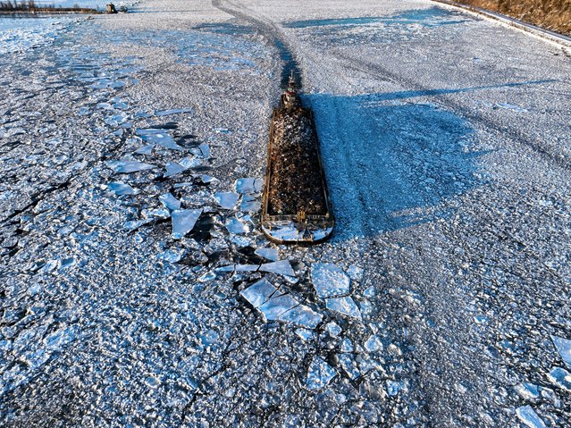 A ship navigates through the ice floes formed on Hudson River in New York, United States on February 23, 2025. Freezing temperatures in New York have frozen sections of the Hudson River, turning the iconic waterway into a winter wonderland. (Photo by Lokman Vural Elibol/Anadolu via Getty Images)