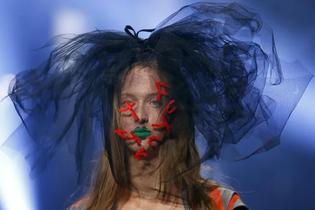 A model wears a creation for Vivienne Westwood's Spring-Summer 2016 ready-to-wear fashion collection, presented during the Paris Fashion Week in Paris, Saturday October 3, 2015. (Photo by Francois Mori/AP Photo)