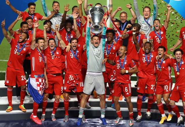 Players of Bayern Munich celebrate at the end of the UEFA Champions League final football match between Paris Saint-Germain and Bayern Munich at the Luz stadium in Lisbon, Portugal on August 23, 2020. Bayern Munich won the match with 1-0. (Photo by Julian Finney/UEFA/Handout/Anadolu Agency via Getty Images)