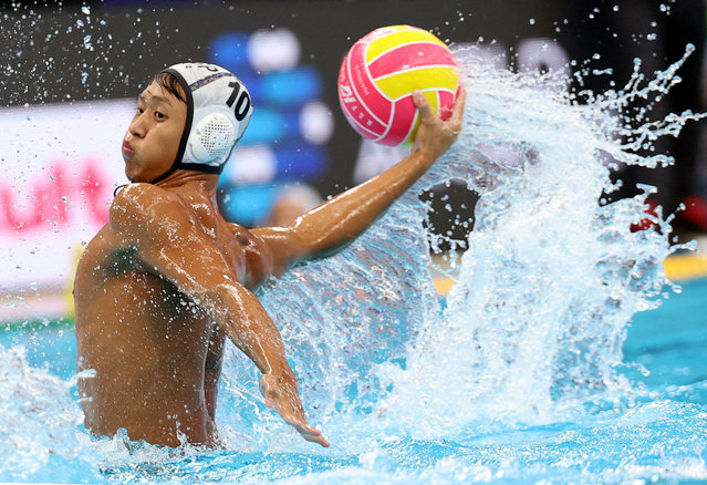 Singapore's Justin Kin Yan Saik in action against Canada in their water polo group matchduring the Singapore 2025 World Aquatics Championships at World Aquatics Championships Arena on July 14, 2025 in Singapore. (Photo by Jeremy Lee/Reuters)
