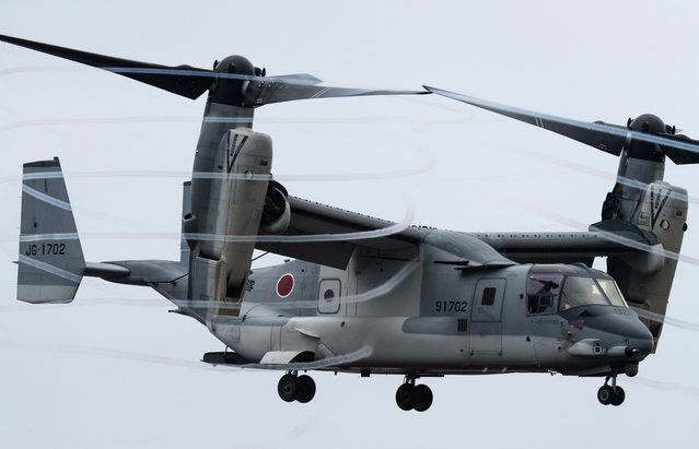 A Japan Ground Self-Defense Force (JGSDF) V-22 Osprey aircraft flies during a live-fire exercise at the East Fuji Maneuver Area on June 08, 2025, in Gotemba, Shizuoka Prefecture, Japan. The annual drill took place after Japanese Prime Minister Shigeru Ishiba stated in March that Japan should increase its defense spending to at least 3% of GDP as soon as possible, in response to pressure from the United States. (Photo by Tomohiro Ohsumi/Getty Images)