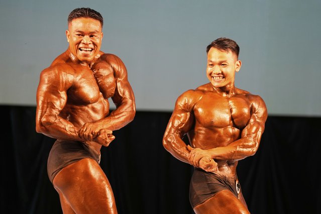 Contestants compete during their bodybuilding competition to mark International Olympic Day at the Myanmar Convention Center in Yangon, Myanmar, Saturday, June 28, 2025. (Photo by Thein Zaw/AP Photo)