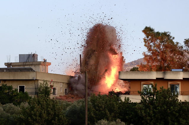 Smoke, flames and debris following an Israeli airstrike in the village of Kfar Tebnit, southern Lebanon, 18 September 2025. Israel's military conducted strikes targeting multiple towns, including Meiss El Jabal and Dibbine, and claimed it struck Hezbollah military targets in southern Lebanon, escalating tensions along the border. (Photo by EPA/EFE/Stringer)