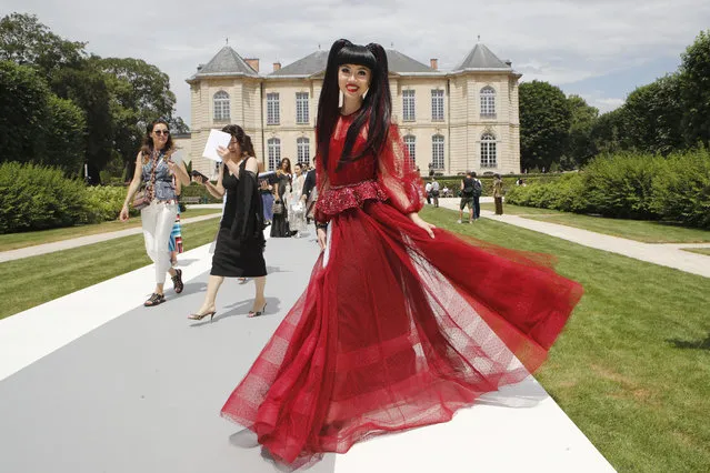 Model Jessica Minh Anh arrives for the Dior Haute Couture Fall-Winter 2018/2019 fashion collection presented Monday, July 2, 2018 at the Rodin museum in Paris. (Photo by Francois Mori/AP Photo)