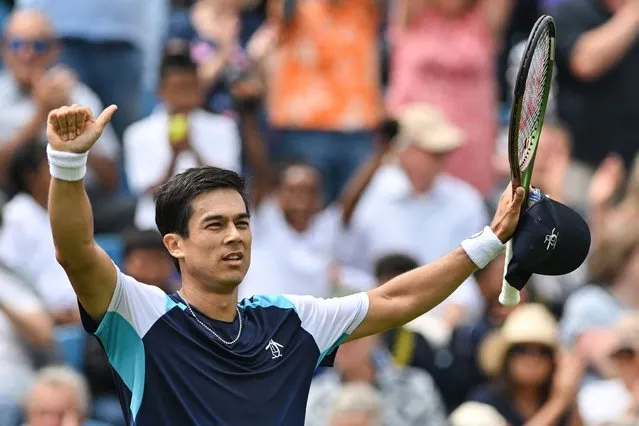 US player Mackenzie McDonald celebrates after winning against US player Taylor Fritz during their men's singles round of 16 tennis match at the Rothesay Eastbourne International tennis tournament in Eastbourne, southern England, on June 28, 2023. (Photo by Glyn Kirk/AFP Photo)