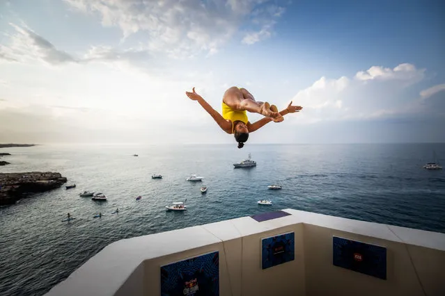 In this handout image provided by Red Bull, Maria Paula Quintero of Colombia dives from the 20 metre balcony during the first competition day of the third stop of the Red Bull Cliff Diving World Series on July 01, 2023 at Polignano a Mare, Italy. (Photo by Romina Amato/Red Bull via Getty Images)