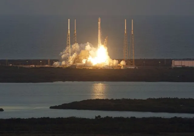 The unmanned Falcon 9 rocket, launched by SpaceX and carrying NOAA's Deep Space Climate Observatory Satellite, lifts off from launch pad 40 at the Cape Canaveral Air Force Station in Cape Canaveral, Florida February 11, 2015. The rocket blasted off on Wednesday to put the U.S. satellite into deep space, where it will keep tabs on solar storms and image Earth from nearly 1 million miles (1.6 million km) away. (Photo by Michael Berrigan/Reuters)