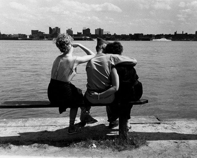 "Three on a Bench, Detroit River," by American photographer Bill Rauhauser, circa 1952. (Photo by Bill Rauhauser)