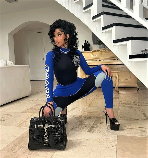 American rapper Belcalis Marlenis Almánzar Cephus, known professionally as Cardi B in the last decade of July 2023 shows off her new “chrome” in sky-high heels. (Photo by iamcardib/Instagram)