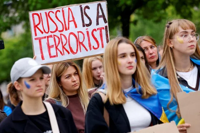 Ukrainians protest outside the Chancellery, as Russia's invasion of Ukraine continues, in Berlin, Germany on July 8, 2022. (Photo by Michele Tantussi/Reuters)
