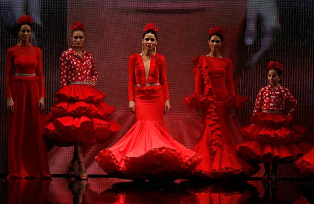 Models present creations by Ana Moron during the International Flamenco Fashion Show SIMOF in the Andalusian capital of Seville, Spain February 8, 2019. (Photo by Marcelo del Pozo/Reuters)