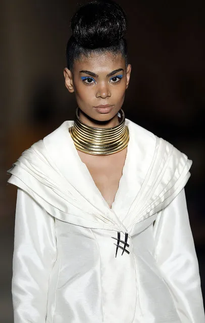 A model wears a creation from the summer collection of South Africa's Mantsho during a Sao Paulo Fashion Week event featuring African designers, at the Brazilian African Museum, in Sao Paulo, Brazil, Friday, April 17, 2015. (Photo by Andre Penner/AP Photo)