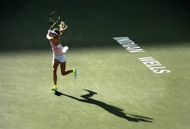 Eugenie Bouchard from Canada in action against Timea Bacsinszky from Switzerland during their third round match at the BNP Paribas Open tennis tournament in Indian Wells, California, USA, 14 March 2016. (Photo by Mike Nelson/EPA)