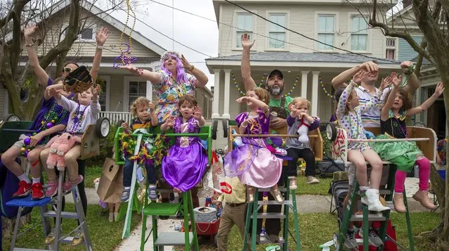 The Krewe of Thoth parades along their traditional Uptown route in New Orleans, Sunday, February 11, 2024, during carnival celebrations ahead of Mardi Gras. (Photo by David Grunfeld/The Times-Picayune)