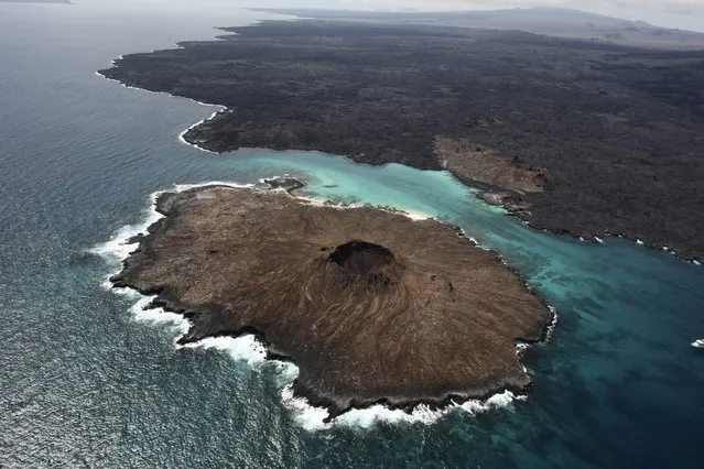 An aerial view of Sombrero Chino Island, Galapagos Islands, Ecuador, January 15, 2011. Ecuador, Colombia, Costa Rica and Panama announced Tuesday, Nov. 2, 2021, that they will expand and join their marine reserves to create a vast corridor that will connect the Galapagos Islands in Ecuador with Colombia's Malpelo Island and the Cocos and Coiba Islands in Costa Rican and Panamanian waters in the Pacific Ocean in hopes of protecting sea turtles, tuna, squid, hammerhead sharks and other species. (Photo by Dolores Ochoa/AP Photo/File)