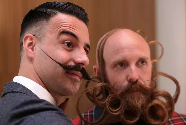 People take part in the international World Beard and Moustache Championships in Antwerp, Belgium May 18, 2019. (Photo by Yves Herman/Reuters)