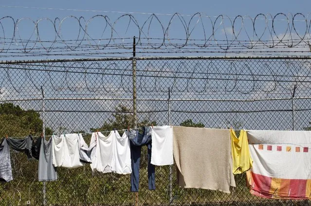 Clothes hang on the fence at La Joya prison on the outskirts of  Panama City, Panama February 5, 2016. (Photo by Carlos Jasso/Reuters)