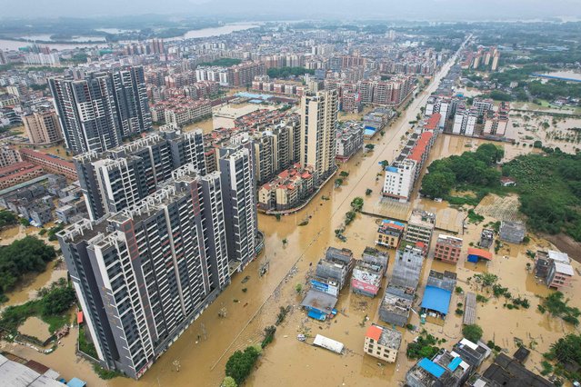 This aerial photo taken on April 22, 2024 shows a general view of flooded buildings and streets after heavy rains in Qingyuan city, in China's southern Guangdong province. (Photo by AFP Photo/China Stringer Network)