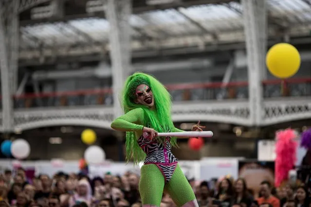 An artist performs during DragWorld UK 2019 convention at the Olympia in London, Britain, August 18, 2019. (Photo by Simon Dawson/Reuters)