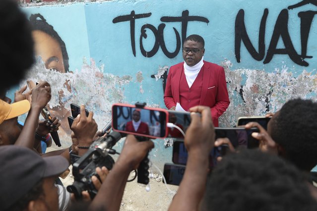 Jimmy Chérizier, a former elite police officer known as Barbecue who leads the G9 and Family gang, speaks to journalists in the Delmas 6 neighborhood of Port-au-Prince, Haiti, July 5, 2024. (Photo by Odelyn Joseph/AP Photo)