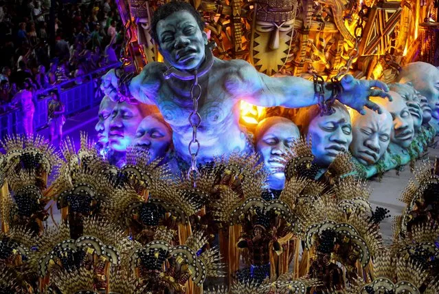 Revellers from Portela samba school perform during the second night of the Carnival parade at the Sambadrome in Rio de Janeiro, Brazil, April 23, 2022. (Photo by Amanda Perobelli/Reuters)