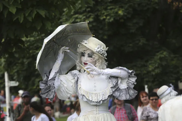 An artist performs during the 7th International Festival of Living Statues in Bucharest, capital of Romania, June 3, 2017. (Photo by Gabriel Petrescu/Xinhua/Barcroft Images)