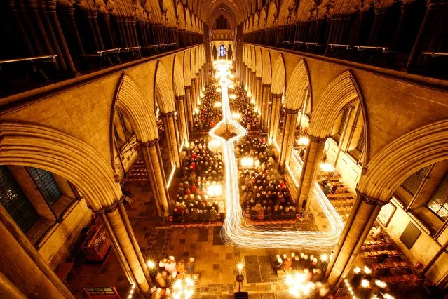 Salisbury Cathedral celebrates the beginning of Advent with a candle-lit service and procession, “From Darkness to Light” in Salisbury, Britain, November 29, 2019. (Photo by Henry Nicholls/Reuters)
