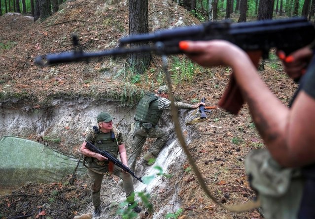 Members of female anti-drone mobile air defence unit “Bucha Witches” from the military Volunteer formation of Bucha territorial community, attend exercises near the town of Bucha in Kyiv region, Ukraine on August 3, 2024. (Photo by Gleb Garanich/Reuters)