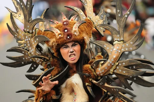 A model wears a Wild Deers costume in the kids carnival during The 13th Jember Fashion Carnival 2014 on August 21, 2014 in Jember, Indonesia. (Photo by Robertus Pudyanto/Getty Images)
