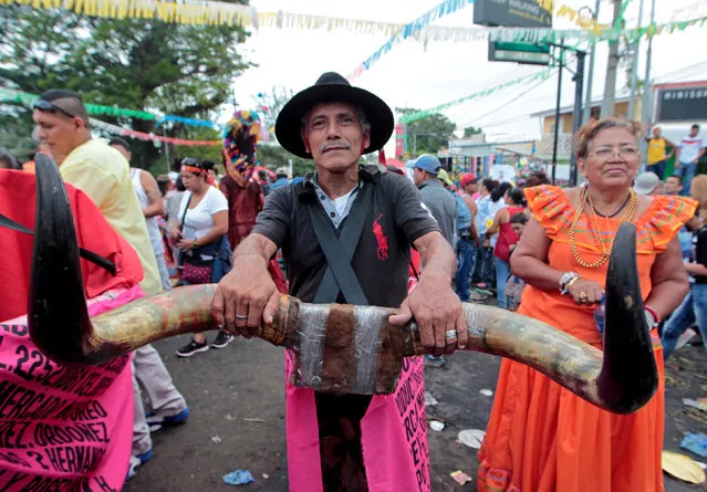 A man takes part in the festivities honouring the capital's patron saint Santo Domingo de Guzman in Managua, Nicaragua August 1, 2016. (Photo by Oswaldo Rivas/Reuters)
