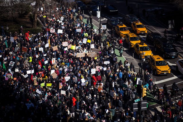 People start marching along the street as they participate in a National Day of Protest on Presidents' Day in New York City on February 17, 2025. (Photo by Eduardo Munoz/Reuters)