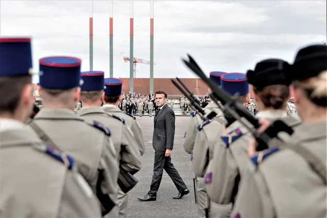 French President Emmanuel Macron reviews the troops at a military school in Bourges, France on October 27, 2022. (Photo by Lewis Joly/Pool via Reuters)