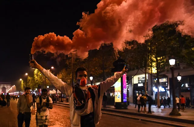 The atmosphere of Parisian supporters during the Champions League final between Paris Saint Germain and Bayern Munich, being played in Portugal and behind closed doors due to the covid-19 epidemic on August 23, 2020 in Paris, France. (Photo by Baptiste Fernandez/Icon Sport via Getty Images)