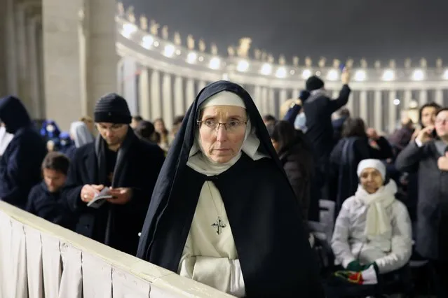 A nun awaits the funeral of Pope Benedict XVI on January 5, 2023 in Vatican City, Vatican. (Photo by Marco Di Lauro/Getty Images)