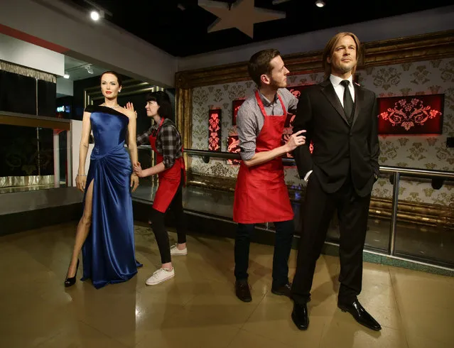 Wax figures of Brad Pitt and Angelina Jolie are moved apart at Madame Tussauds in London, UK on September 21, 2016, following news of the couple’s divorce. (Photo by Yui Mok/PA Wire)