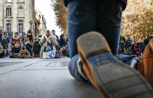 Catholics gathered outside Saint Andre cathedral to protest by singing and praying against the closure of Sunday Mass, in accordance with the government measures taken to curb the coronavirus (Covid-19) pandemic, in Bordeaux, France on November 22, 2020. (Photo by Ugo Amez/SIPA Press)
