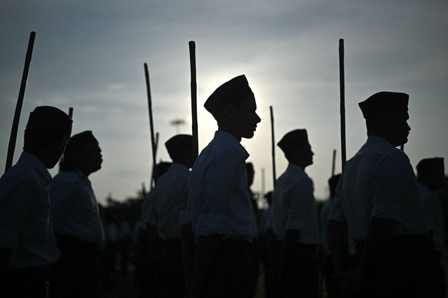 Rashtriya Swayamsevak Sangh (RSS) volunteers wait to take part in the Hindu nationalist organisation's centenary celebrations at Reshimbagh Ground in Nagpur, India on October 2, 2025. (Photo by Idrees Mohammed/AFP Photo)