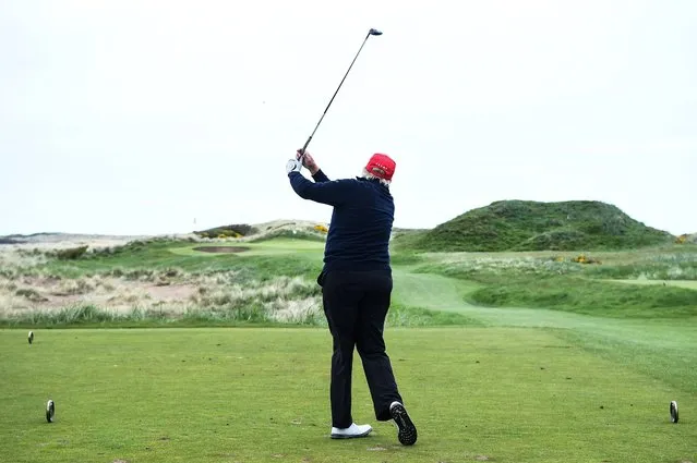 Former US President Donald Trump plays golf at the Trump Turnberry Golf Courses, in Turnberry on the west coast of Scotland on May 2, 2023, during the second day of his first visit to the country since losing the Presidency. (Photo by Andy Buchanan/AFP Photo)