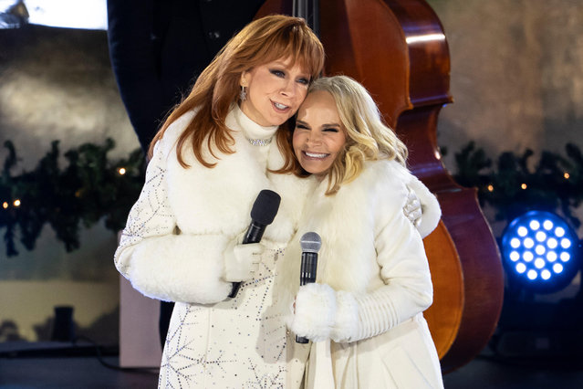Reba McEntire, left, and Kristin Chenoweth, right, perform during the 93rd annual Rockefeller Center Christmas tree lighting ceremony, Wednesday, December 3, 2025, in New York. (Photo by Yuki Iwamura/AP Photo)