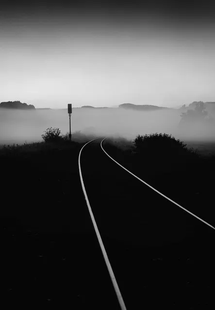 “Destination Unknown”. Following a lonely road in my new village during the early hours, I came upon a dead end. However just as I was about to depart I noticed the railroad tracks and how the fog swallowed them and it got me to thinking. Where was the rail leading to? How many people would be on the train very soon heading to... destination unknown. Location: Rehweiler, Germany. (Photo and caption by Mark Seawell/National Geographic Traveler Photo Contest)