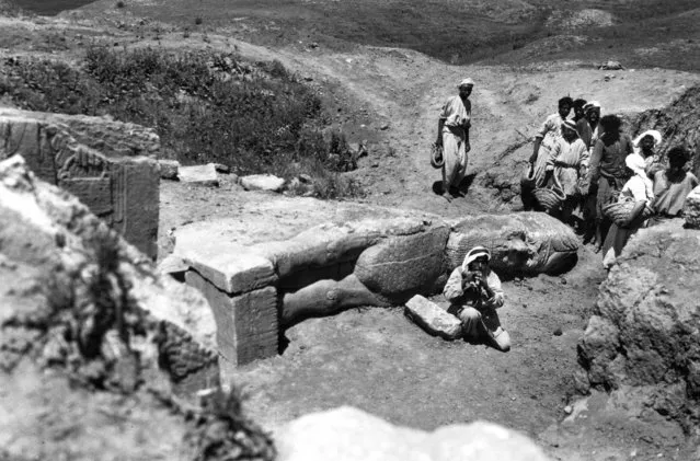 This 1949 photo taken by British mystery author Agatha Christie shows a statue of a lamassu, a winged bull from Assyrian mythology who guarded the royal court from evil, at the ancient site of Nimrud, near modern day Mosul, Iraq. Christie had a little-known link to Nimrud: She accompanied her husband, archaeologist Max Mallowan, as he excavated the onetime capital of the Assyrian Empire, and she assisted by piecing together some artifacts and chronicling the dig in photos and film.  (Photo by Agatha Christie via AP Photo)