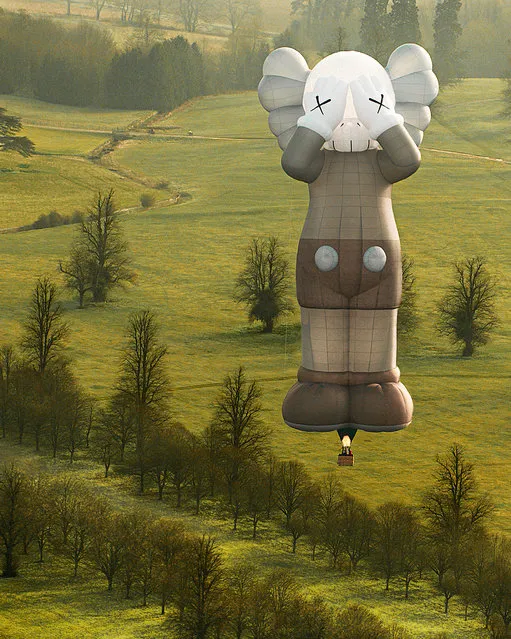 In this photo released on May 17, 2021, artist KAW’s latest work and the 42-meter tall hot-air balloon “KAWS:HOLIDAY” takes flight prior to May 16, 2021 in Bristol, England. KAWS and longtime collaborator, AllRightsReserved is bringing KAWS:HOLIDAY back from outer space into Earth’s atmosphere in May. (KAWS, Courtesy of AllRightsReserved Ltd.) (Photo by AllRightsReserved/Getty Images)