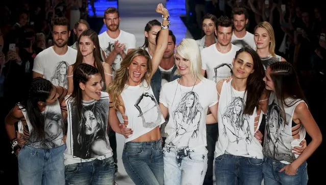 Model Gisele Bundchen reacts as she and other models present creations from the Colcci Summer 2016 collection during Sao Paulo Fashion Week in Sao Paulo April 15, 2015. (Photo by Paulo Whitaker/Reuters)