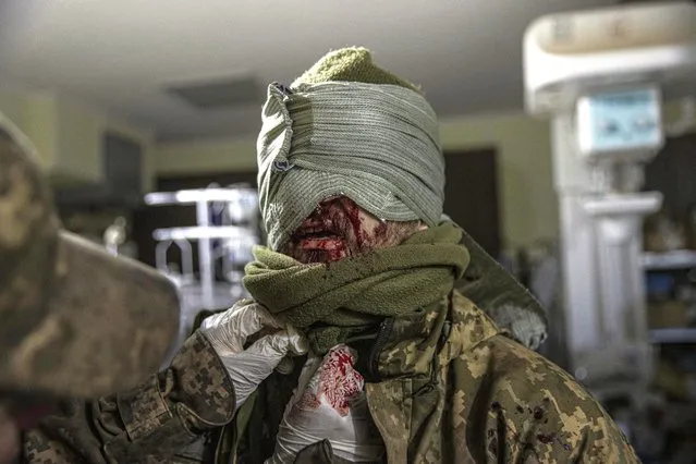 A Ukrainian soldier, wounded in conflicts within Russian-Ukrainian war, receives treatment at Bakhmut Hospital in Bakhmut, Donetsk Oblast, Ukraine on December 5, 2022. (Photo by Metin Aktas/Anadolu Agency via Getty Images)