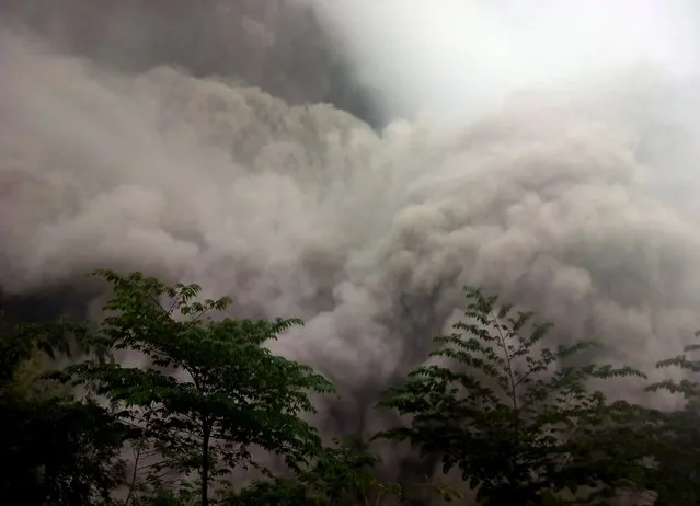 Video image released by Indonesia's National Disaster Management Agency (BNPB) shows Mount Semeru spewing volcanic materials in Lumajang, East Java, Indonesia, December 4, 2021. Semeru volcano in Indonesia's East Java province erupted on Saturday. (Photo by Xinhua News Agency/Rex Features/Shutterstock)
