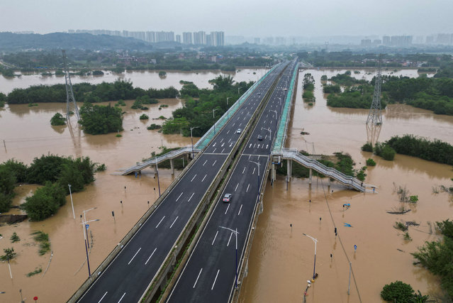 A drone view shows roads submerged in floodwaters following heavy rainfall, in Qingyuan, Guangdong province, China on April 22, 2024. (Photo by Tingshu Wang/Reuters)