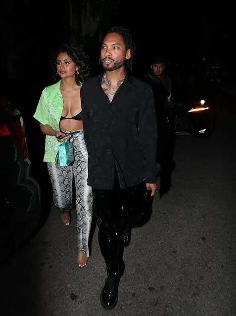 Miguel holds hands with lovely wife Nazanin Mandi during a night out at Nice Guy in West Hollywood on Wednesday, July 10, 2019. Mandi puts on a very busty display in her barely there top and skakeskin pants. (Photo by X17online.com/SIPA Press)