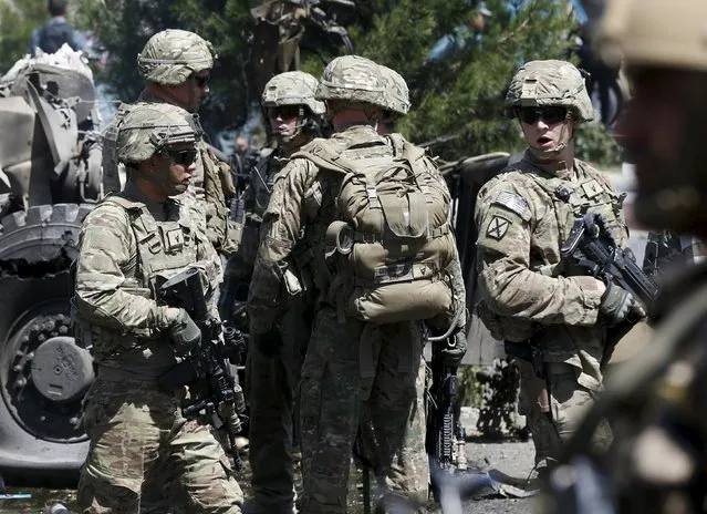 U.S. troops arrive at the site of a suicide bomb attack in Kabul, Afghanistan, June 30, 2015. (Photo by Omar Sobhani/Reuters)