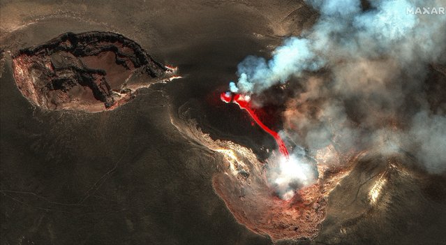 This color infrared image released by Maxar Technologies shows lava flowing from the Mount Etna volcano erupting, in Sicily, Italy, Thursday, July 4, 2024. (Photo by Satellite image 2024 Maxar Technologies via AP Photo)