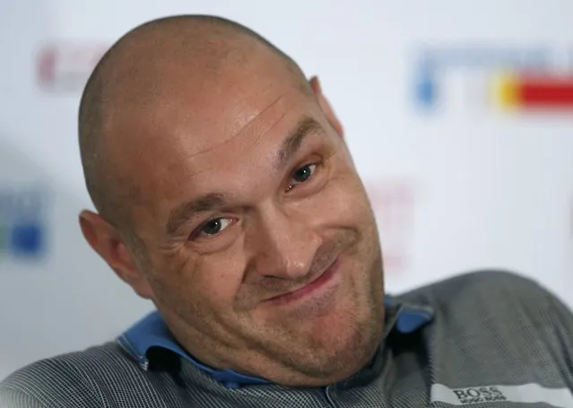 British boxer Tyson Fury reacts during a news conference in Duesseldorf, Germany, July 21, 2015. Unbeaten British boxer Tyson Fury will get a shot at the world heavyweight title in October after agreeing terms for a meeting with champion Vladimir Klitschko. The 39-year-old Ukrainian's WBA, WBO, IBF and IBO crowns will be on the line when the pair meet in the German city of Duesseldorf October 24, 2015 in Duesseldorf. (Photo by Ina Fassbender/Reuters)